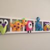 decoration murale chambre enfant avec petits dinosaures, oiseau et hiboux multicolores